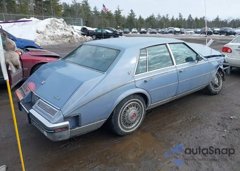 1984 Cadillac Seville z USA, uszkodzony, nr VIN 1G6AS6989EE826093